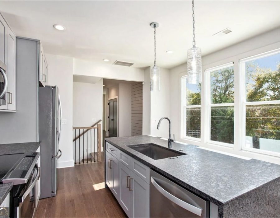 008_unit 1 kitchen towards stairs-min