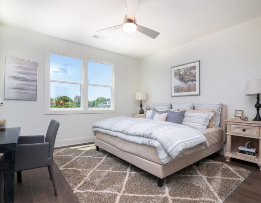 016_Village Stacks primary bedroom unit 7-min