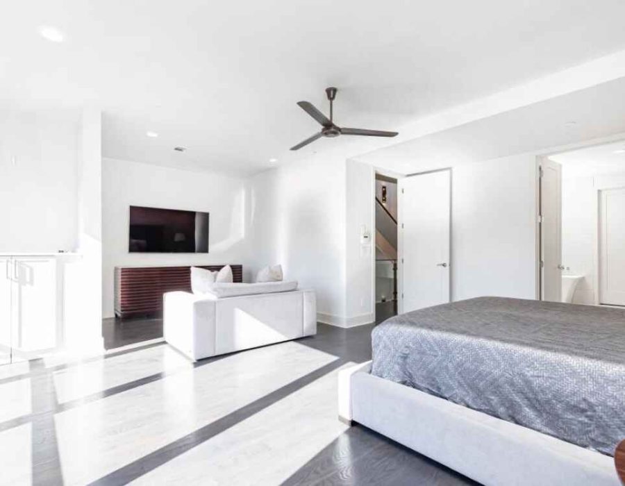 021_Primary Bedroom with TV 910 Lenox Blvdboulevard